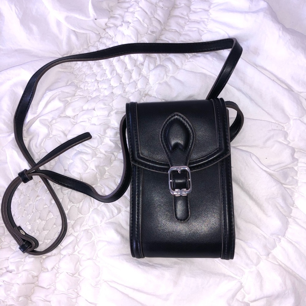 Black cross body Sam Edelman bag.